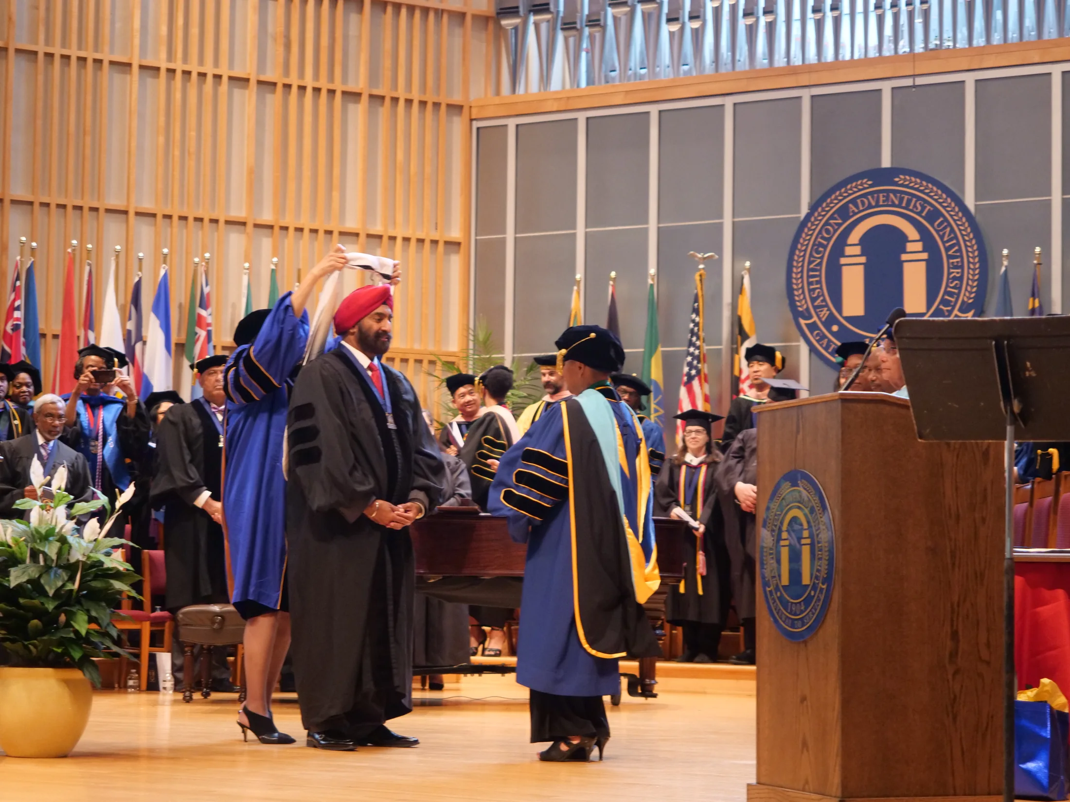 Dr. Jasdip Singh Jesse during a Washington Adventist University recognition ceremony