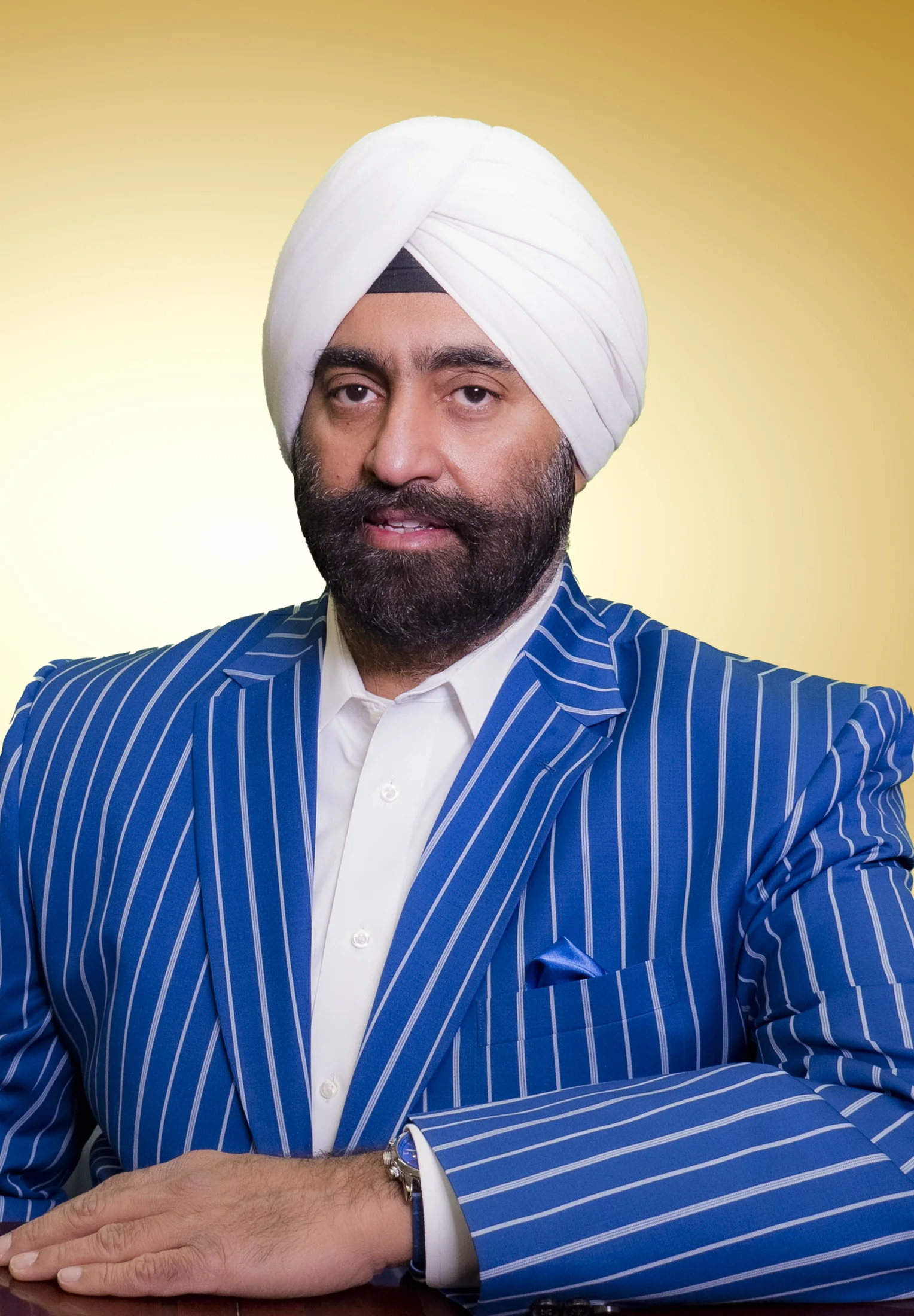 Dr. Jasdip Singh Jesse in a formal portrait