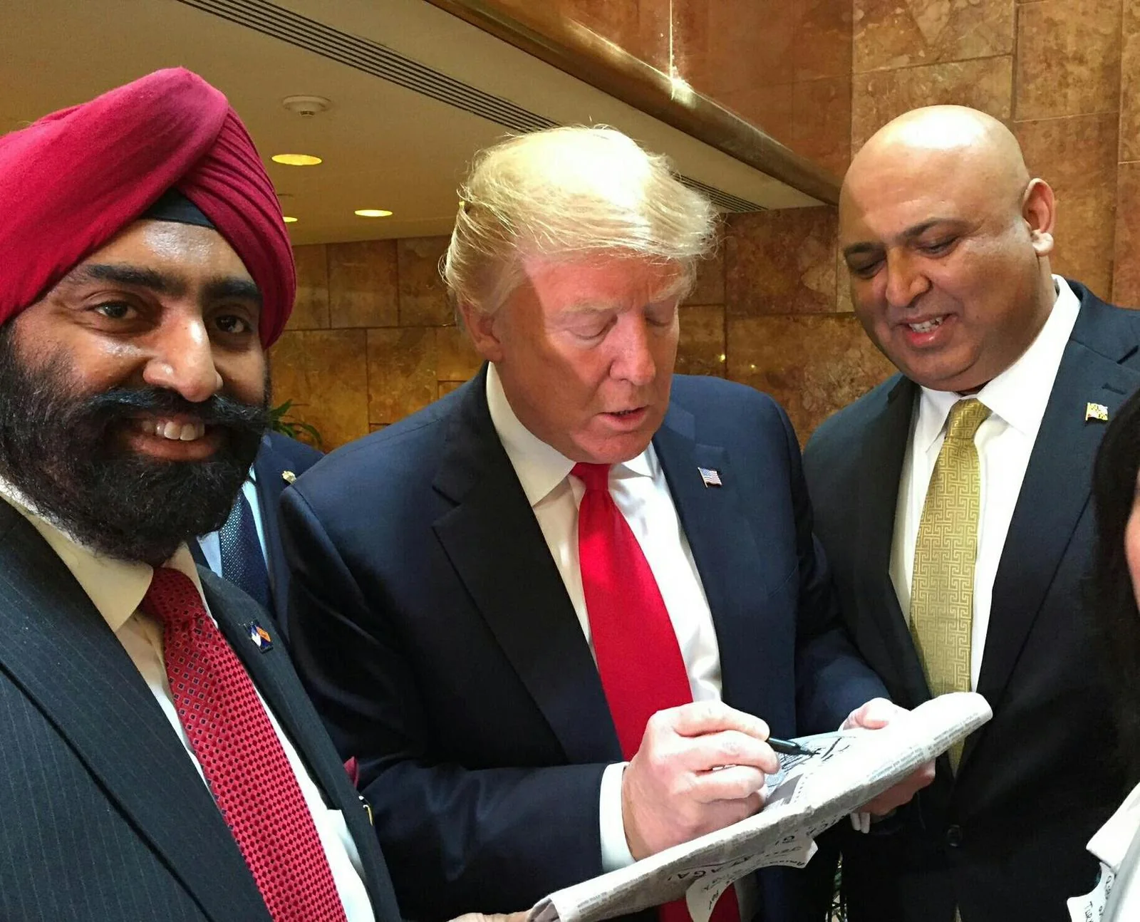 Dr. Jasdip Singh Jesse with President Donald J. Trump during a public engagement