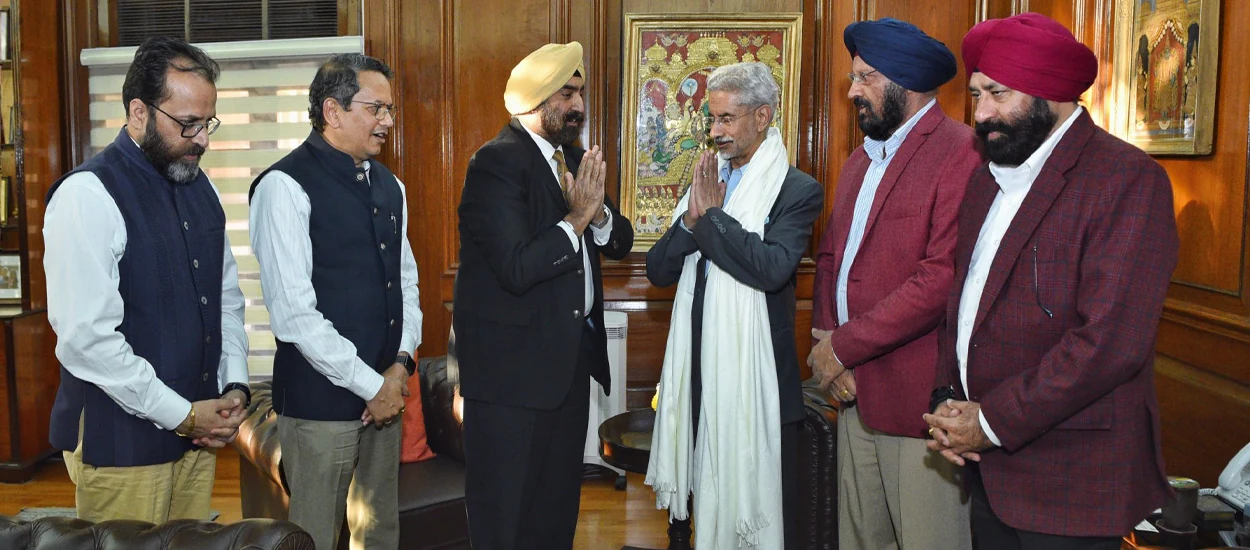 Dr. Jasdip Singh Jesse in a diplomatic engagement